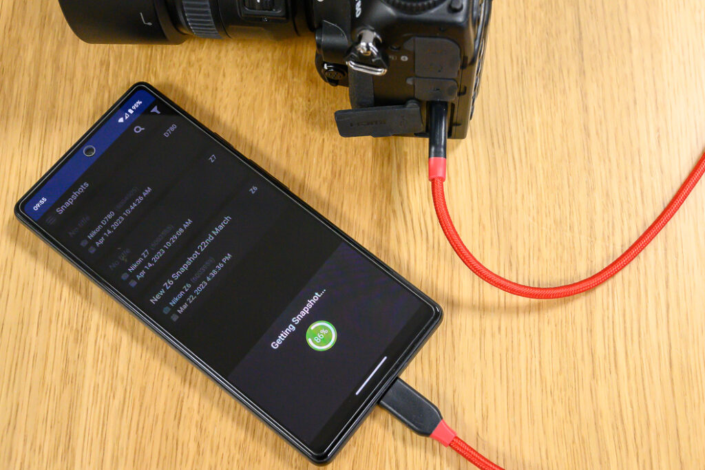 An image showing Reikan FoCal Snapshots connected to a camera with a USB cable.